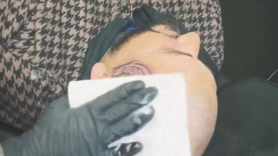 Mayan head tattoo